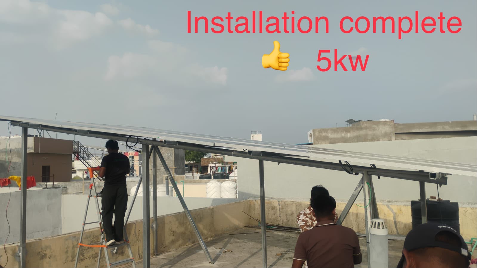 Installation team completing a 5 kW rooftop solar structure